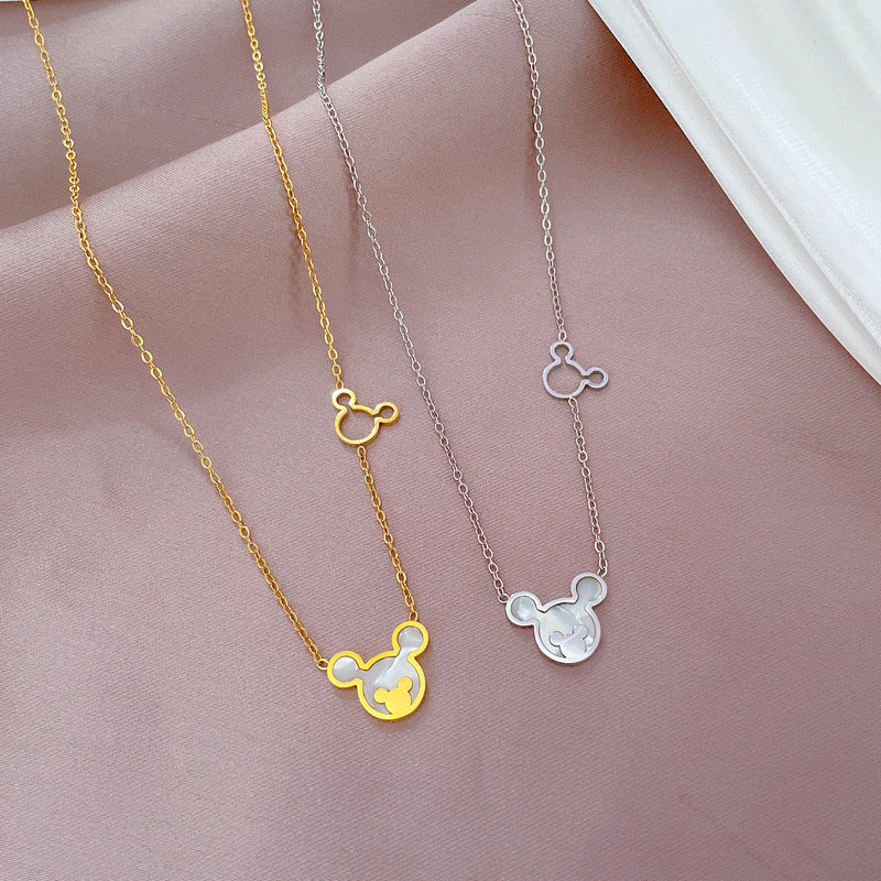 Collana girocollo minimalista in acciaio al titanio con motivo floreale, geometrico e cartone animato