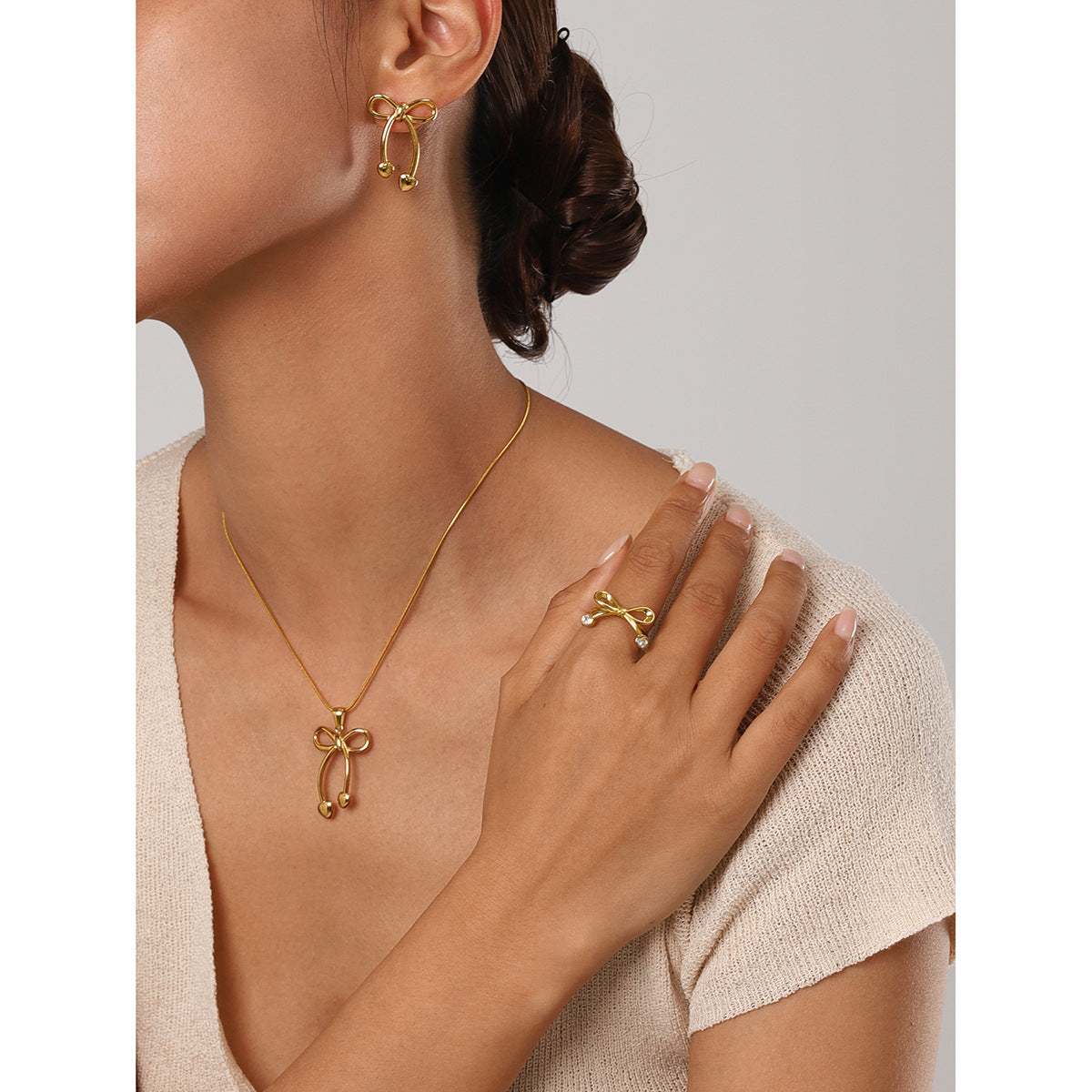 Minimalist Bow-Shaped Stainless Steel Necklace with Plated Finish for Women
