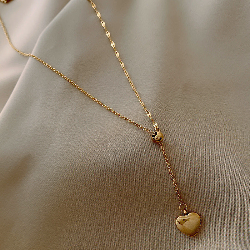 Minimalist Elegant Gold-Tone Titanium Steel Heart Pendant Necklace for Women Adjustable Clavicle Chain