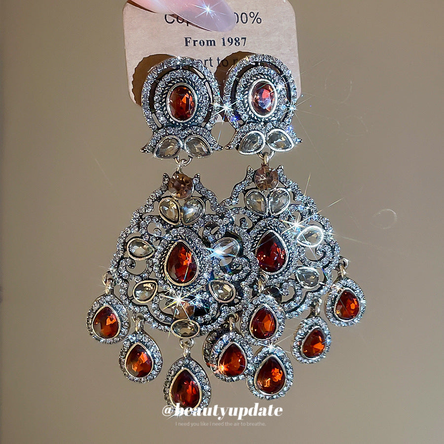Orecchini pendenti geometrici stile vintage con intarsio in strass, base in lega e perni in acciaio inossidabile da donna