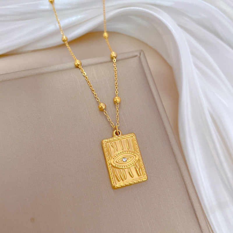 Minimalist Geometric Titanium Steel Pendant Necklace for Women and Men with Gold Plated Finish and Angular Bead Detail