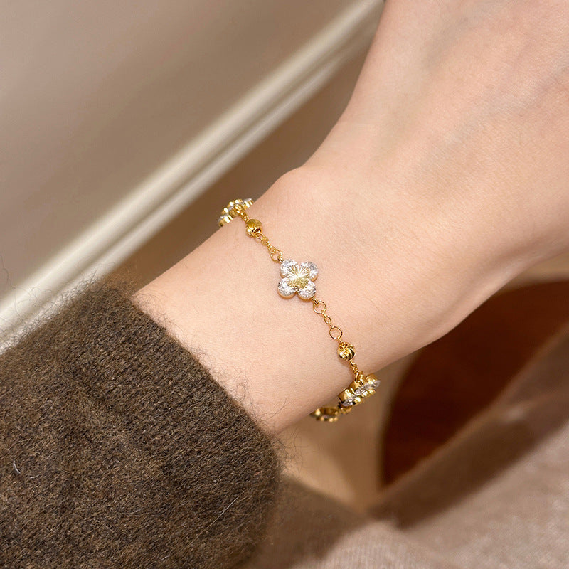 Elegante bracciale da donna regolabile in rame con zirconi a forma di fiore e stile minimalista di lusso