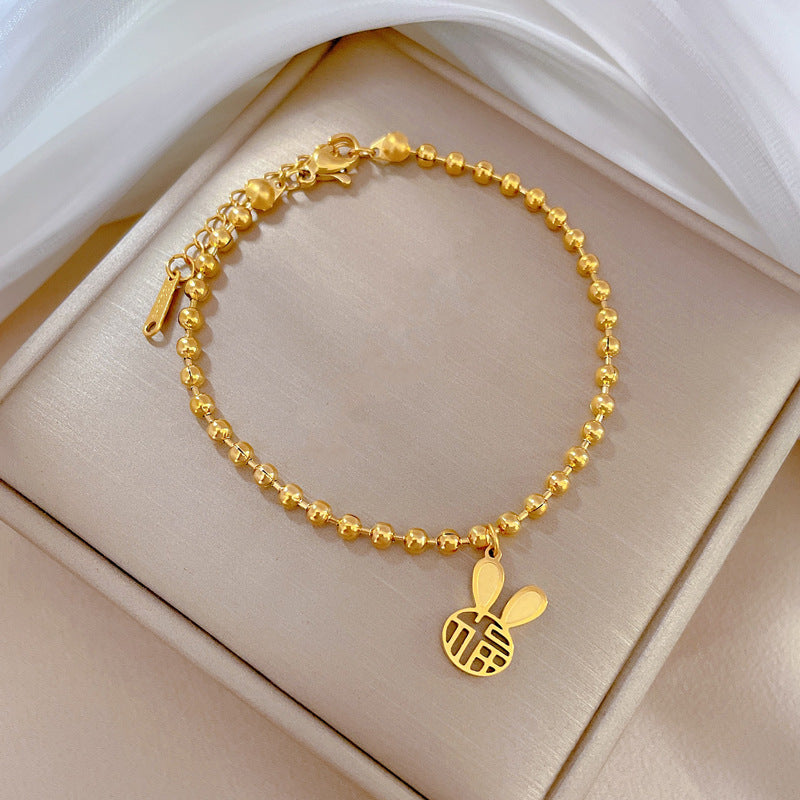 Vintage Korean-Inspired Titanium Steel Rabbit and Chinese Character Fu Pendant Bracelet for Women with Gold Plating and Wavy Texture