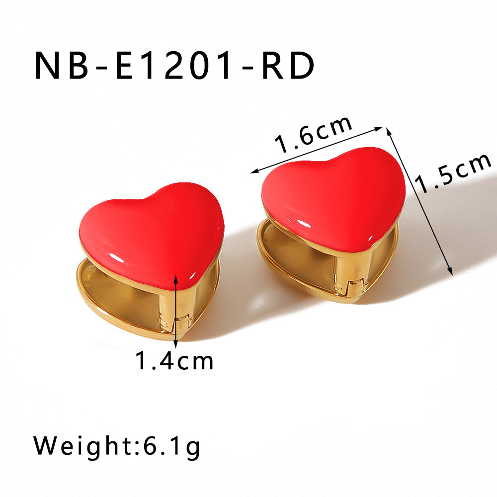 Orecchini da donna in acciaio al titanio con placcatura in oro 18 carati a forma di cuore e sfera, dal design minimalista