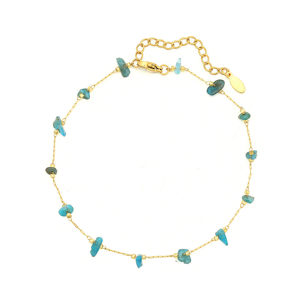 Elegante tobillera geométrica de acero de titanio para mujer con acento de piedra natural en azul pavo real