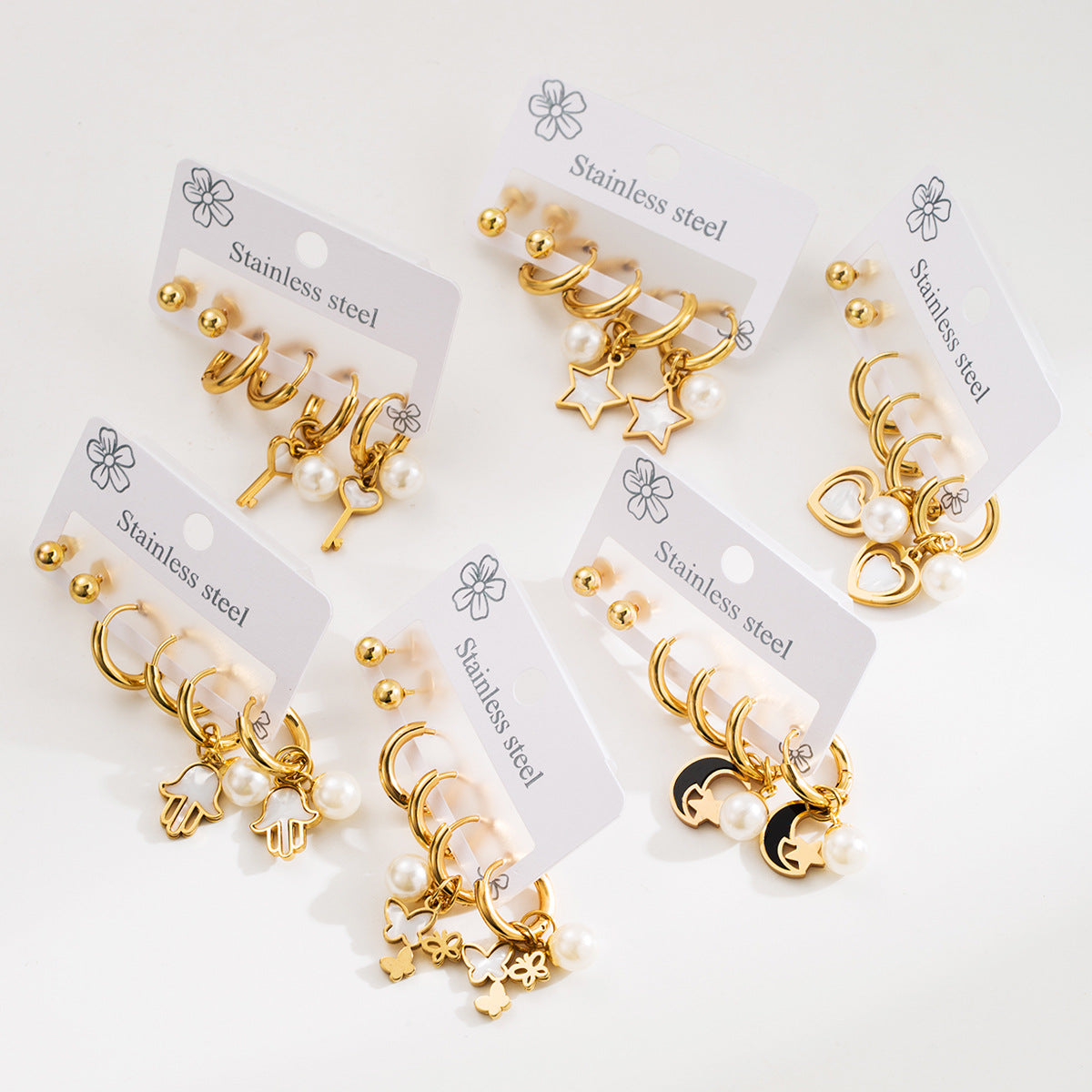 Pendientes de botón minimalistas geométricos de acero inoxidable con acabado chapado para mujer