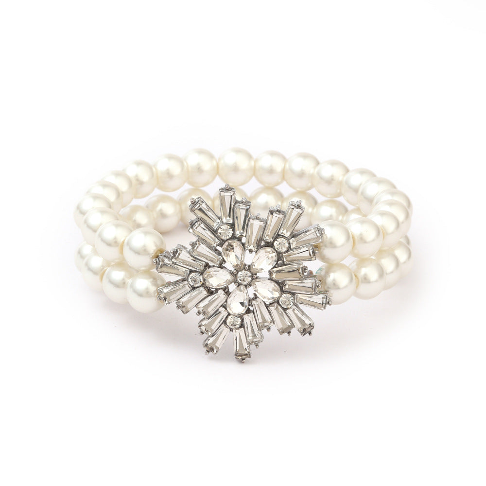 Original Design Snowflake Pendant Set with Imitation Pearl Necklace, Rhinestone Earrings, and Pearl Bracelet for Women