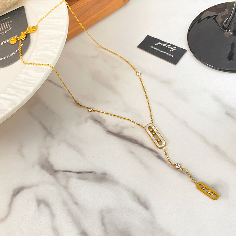 Minimalist Geometric Titanium Steel Necklace with Gold Plating, Micro-set Diamond and Shell Tassel