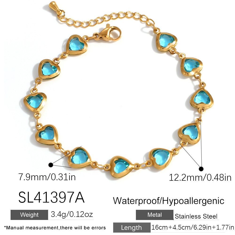 Elegante bracciale da donna in acciaio inossidabile placcato oro 18 carati a forma di cuore con intarsio di cristalli colorati