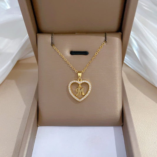 Collar minimalista de acero de titanio en forma de corazón con incrustaciones de diamantes de imitación para mujeres y hombres, delicada cadena de clavícula con colgante geométrico