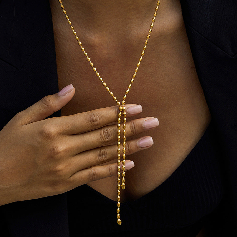 Collana a Y geometrica in acciaio inossidabile con pendente in titanio e finitura placcata per donna