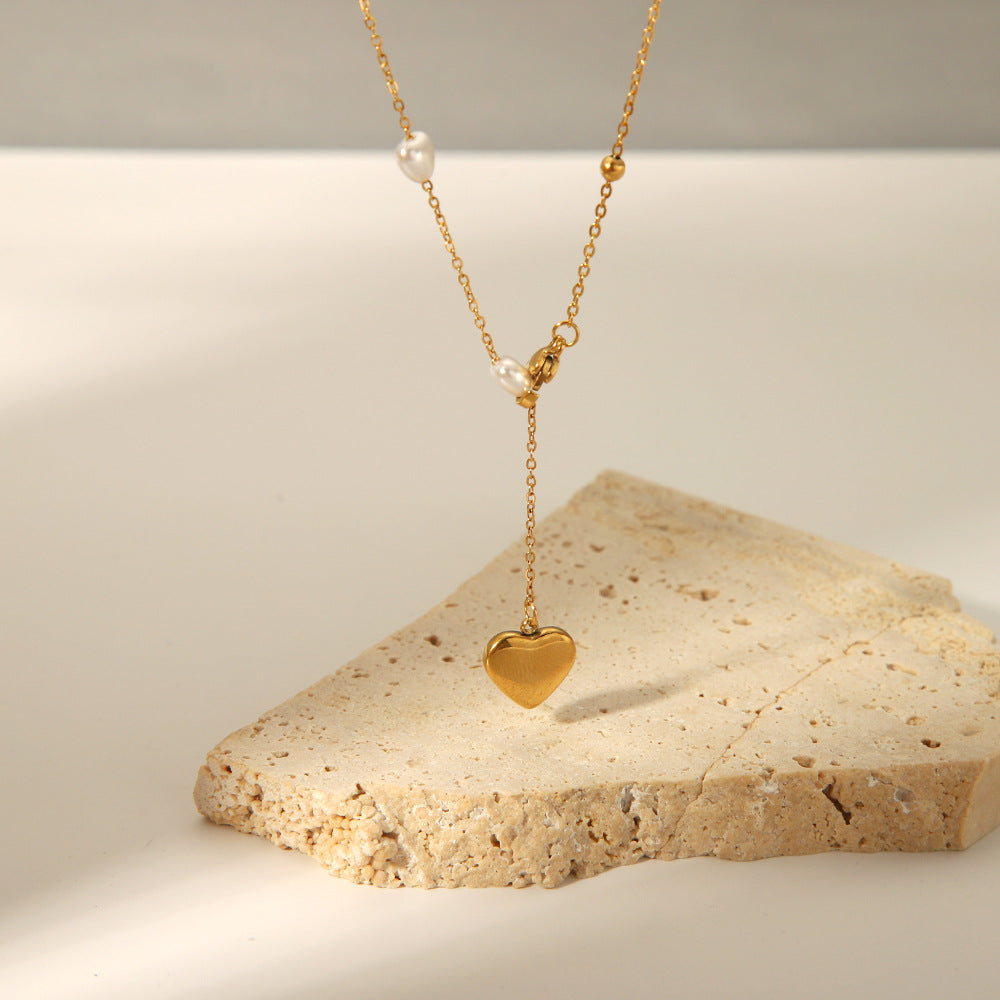 Minimalist Heart-Shaped Titanium Steel Pendant Necklace for Women with Plated Stainless Steel Chain and Pearl Accent