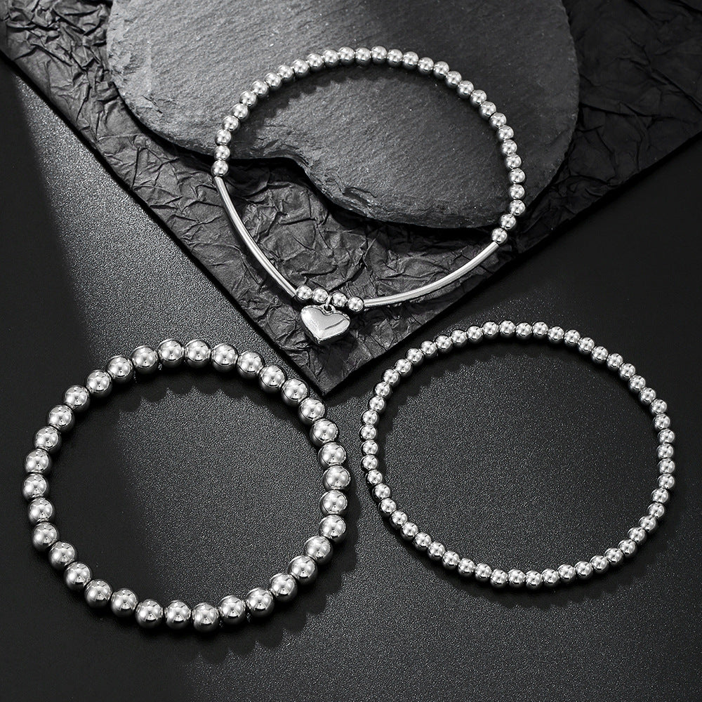 Set bracciale con ciondolo a cuore geometrico in acciaio inossidabile da donna con perline miste e design impilabile