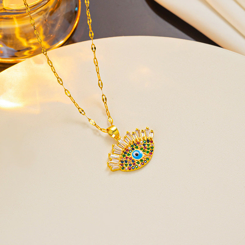 Fashionable Evil Eye Pendant Necklace for Women in Titanium Steel with Rhinestone Inlay and 18K Gold Plating on Wavy Chain