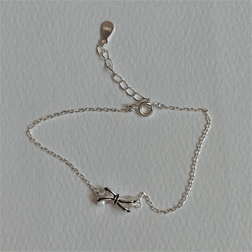 Minimalist Bow Knot Bracelet in 925 Sterling Silver with Geometric Edged Beads and Electroplated Finish