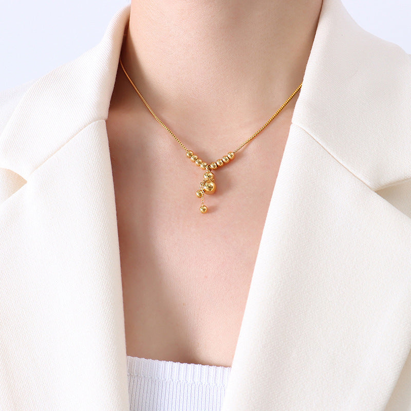 Collana con ciondolo a zucca a perline rotonde con carattere Fu in stile cinese minimalista, in acciaio al titanio placcato oro, unisex