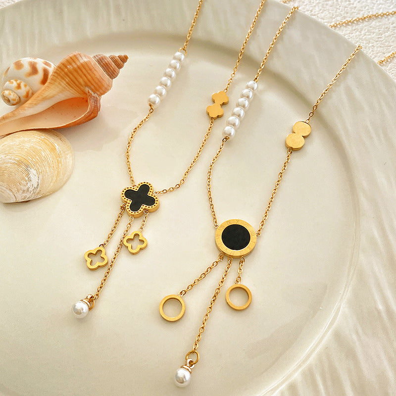 Hollow Four-Leaf Clover Tassel Titanium Steel Necklace