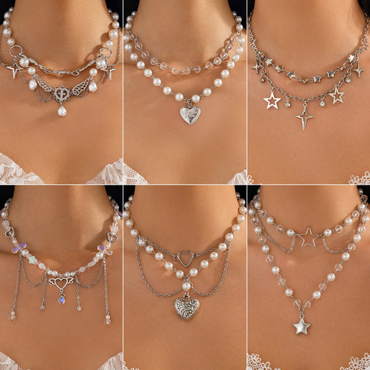 Collar con colgante de corazón y estrella dulce y atrevido con borlas para mujer, cadena de aleación con perlas de imitación