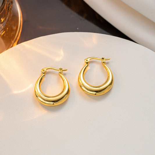 Pendientes minimalistas ovalados chapados en oro de acero titanio de estilo vintage para mujer