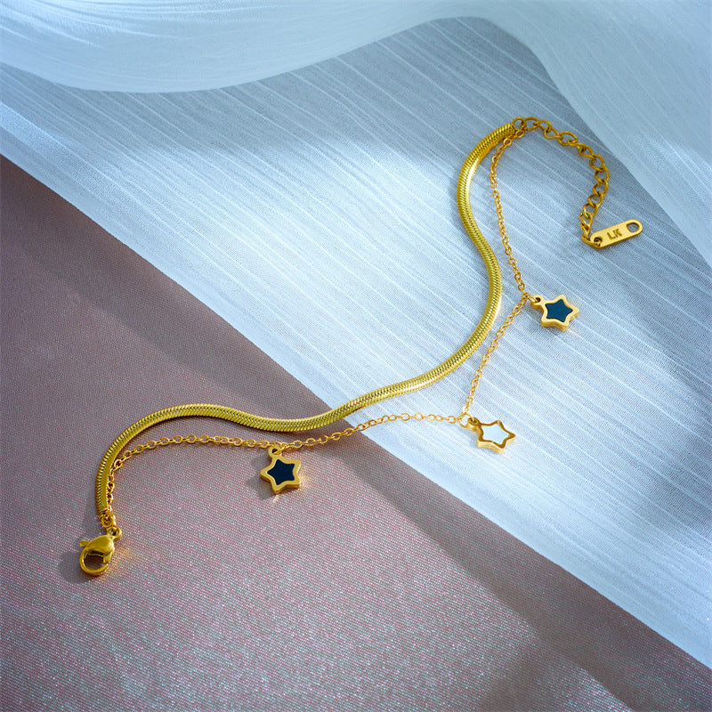 Bracciale con ciondolo a stella bicolore minimalista in acciaio al titanio per donna