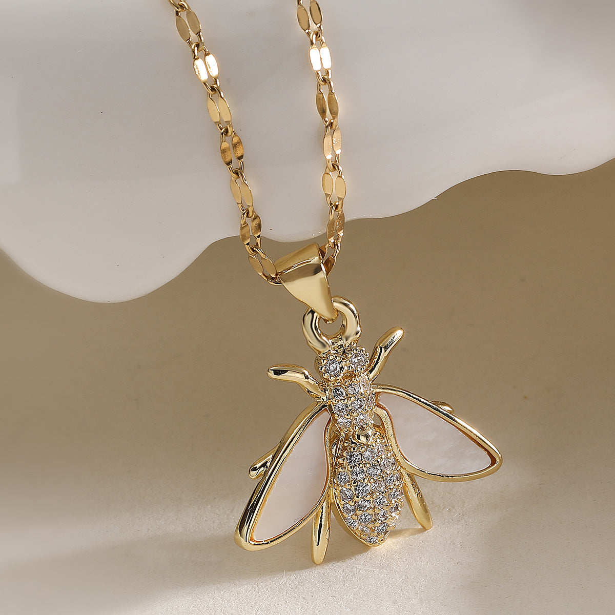 Minimalist Gold Plated Brass Bow Pendant Necklace with Cubic Zirconia for Women