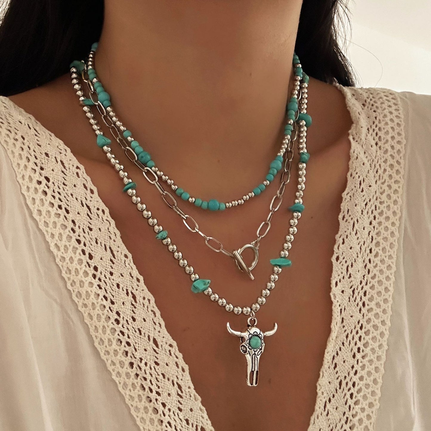 Collana con ciondolo in lega geometrico a croce a forma di testa di toro finta turchese etnica vintage da donna