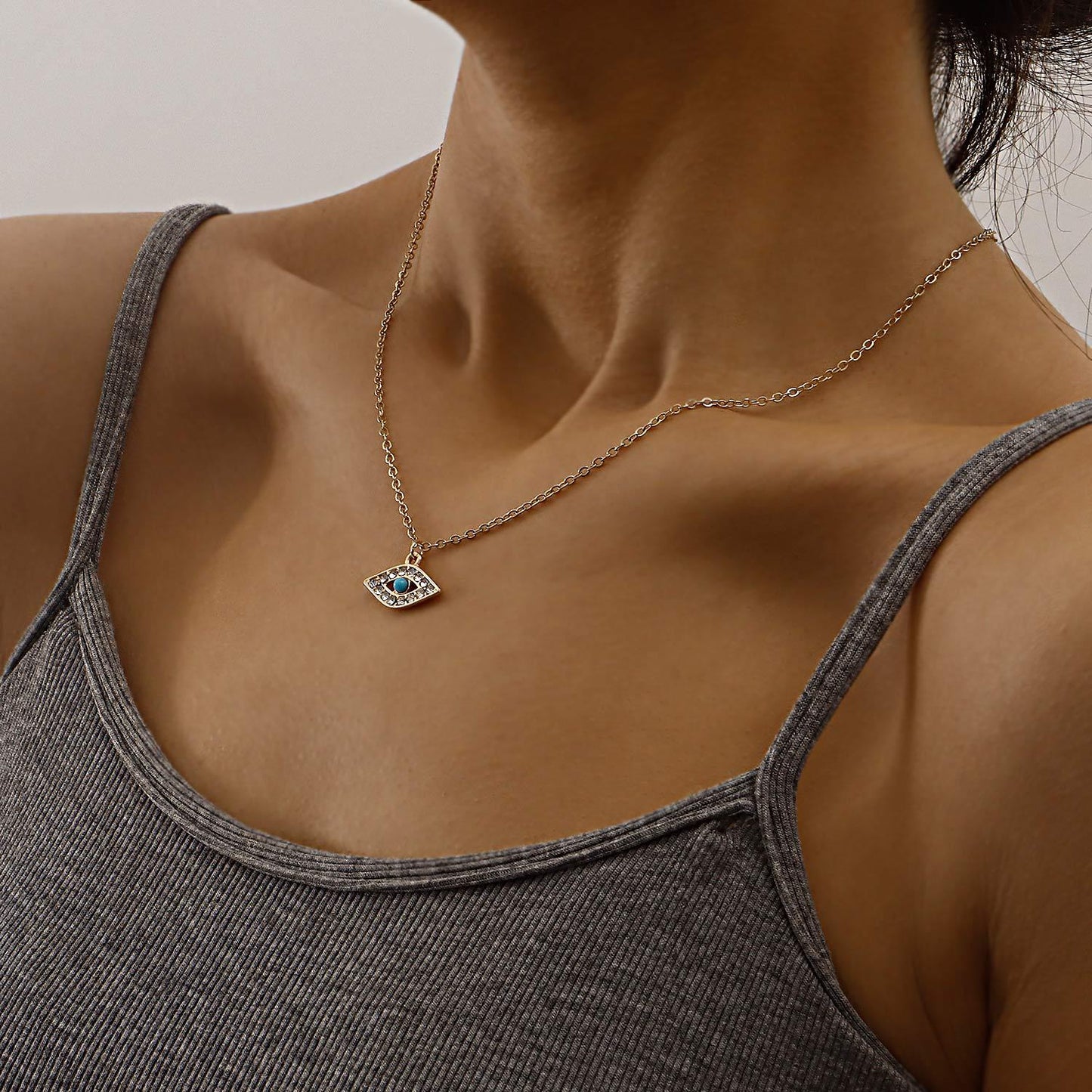 Punk Vintage Geometric Evil Eye Pendant Necklace for Women with Alloy Body, Rhinestone Inlay, and Plated Finish on Delicate Clavicle Chain