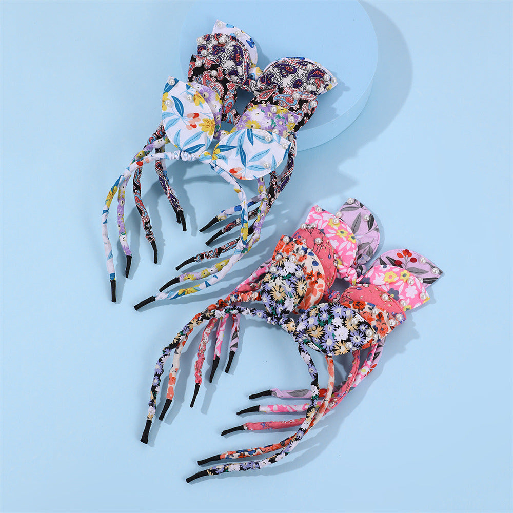 Bonito conjunto de diademas en forma de lazo para niñas con banda de tela y adornos de perlas, patrón floral estilo princesa