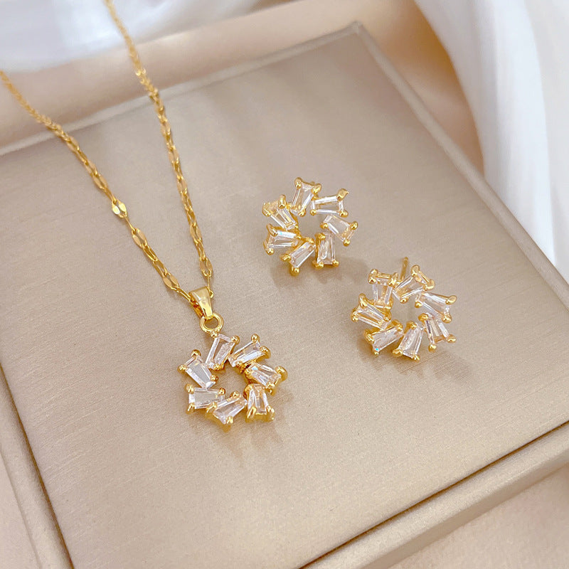 Conjunto de collar y pendientes de acero de titanio de lujo con diamantes de imitación geométricos