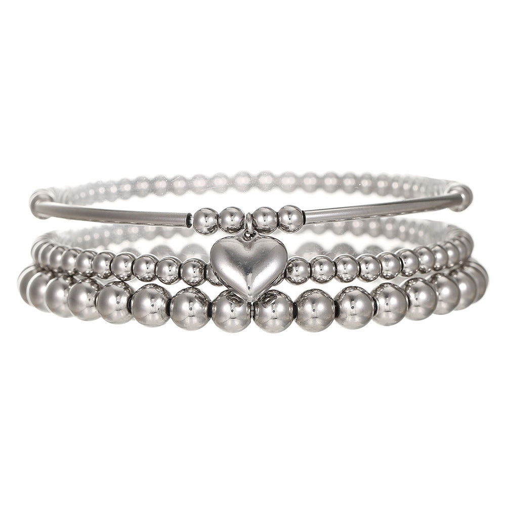 Set bracciale con ciondolo a cuore geometrico in acciaio inossidabile da donna con perline miste e design impilabile