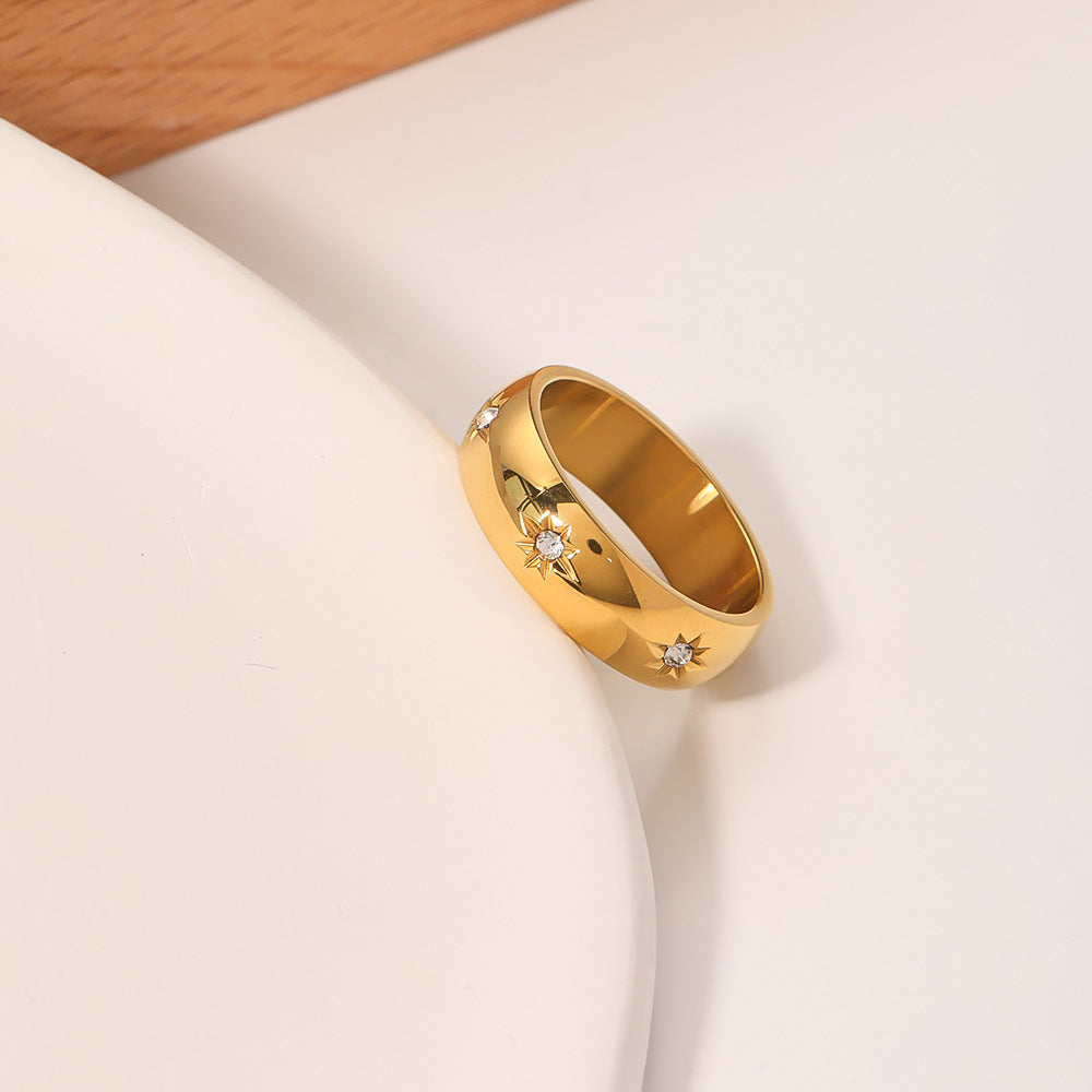Anello da donna minimalista in acciaio al titanio con stella a otto punte e intarsi di strass