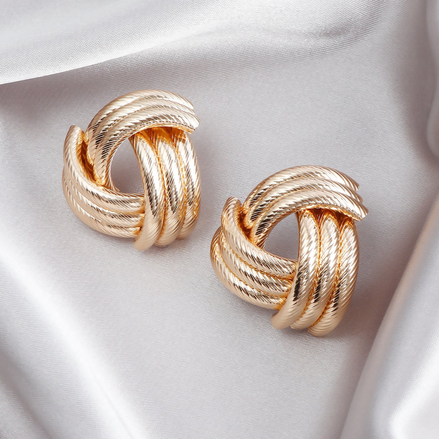 Vintage Geometric Metal Stud Earrings with Hollow Interwoven Design and Electroplated Finish