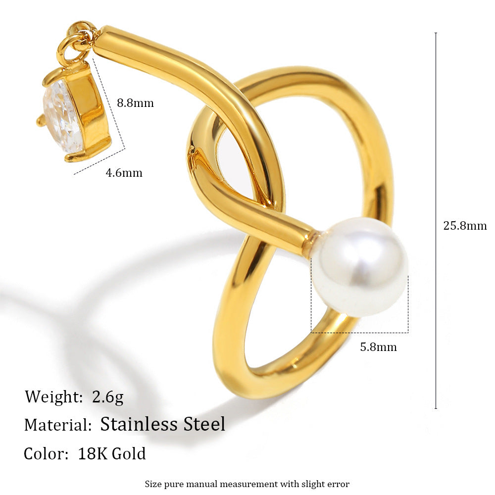 Anillo minimalista de acero inoxidable con chapado en oro de 18 quilates, detalle de nudo, acento de borla, circonita cúbica e incrustación de perlas de imitación