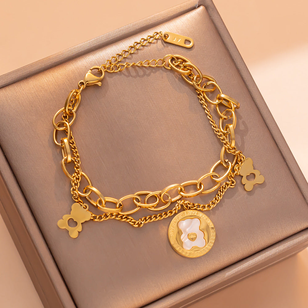 Bracciale a doppio strato in acciaio al titanio placcato oro rosa con ciondoli a cuore e orsetto, gioielli alla moda e casual da donna