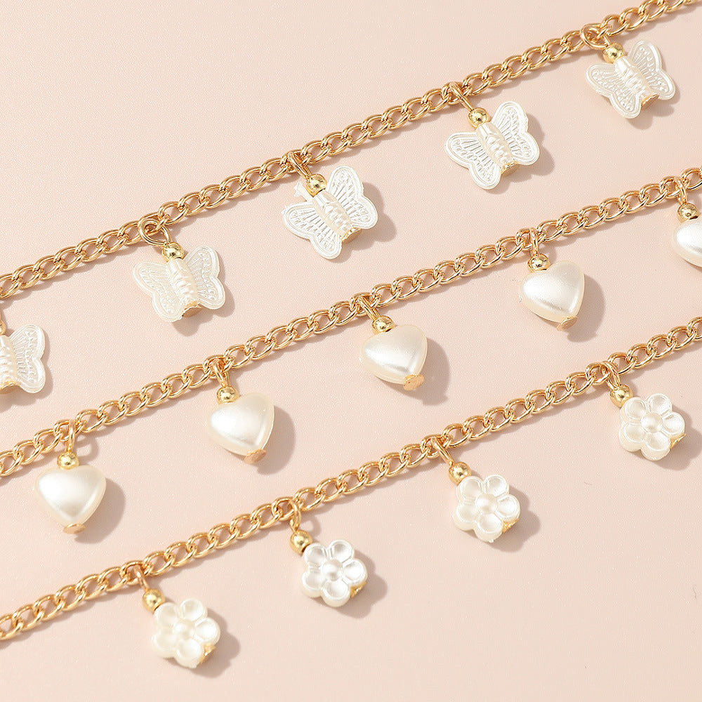 Conjunto de pulseras de metal con colgante de perlas, flores y mariposas en forma de corazón, hecho a mano, estilo princesa, para niñas