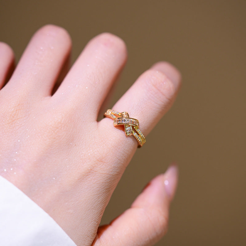 Luxury Minimalist X-Shaped Geometric Ring for Women in Copper Base with 18K Gold Plating and Micro-Paved Zirconia