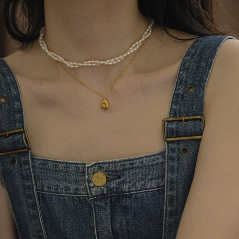 Collana con ciondolo quadrato a goccia tridimensionale a forma di ottagramma in stile francese romantico con gemma in acciaio al titanio con placcatura in oro per una ritenzione del colore a lungo termine