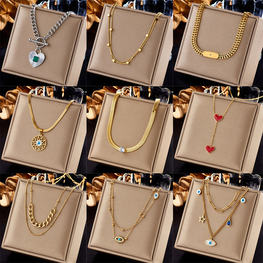 Collana con ciondolo rotondo a cuore, stella e occhio, stile vintage minimalista, in acciaio inossidabile con smalto e strass intarsiati