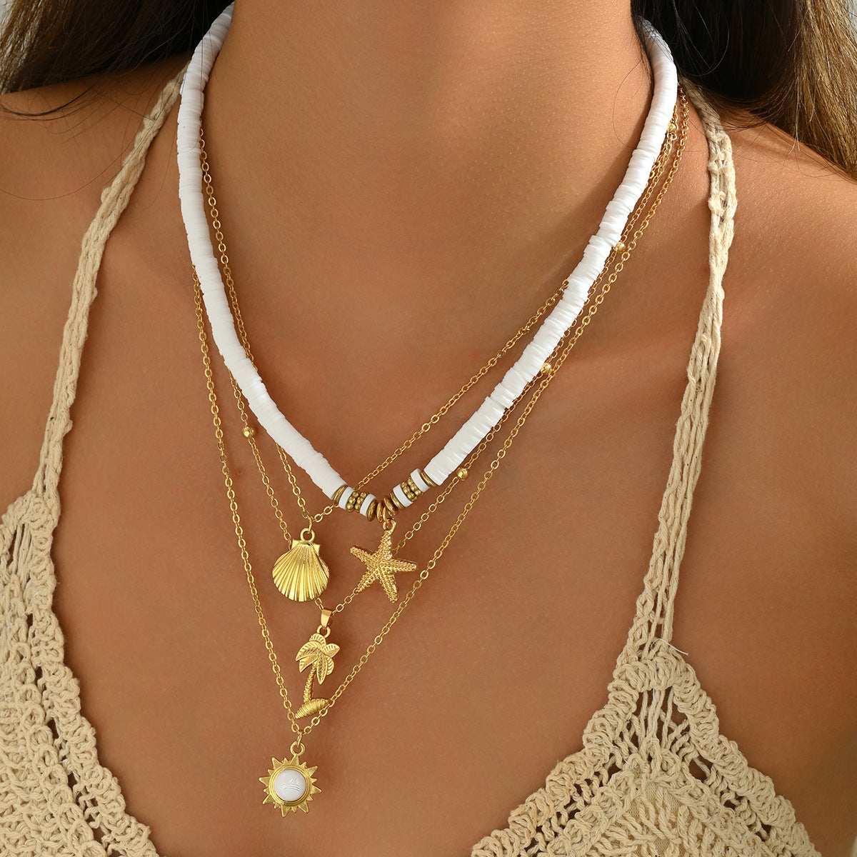 Collar colgante de estrella de mar y concha geométrica de aleación de zinc con cadena de clavícula multicapa tejida a mano para mujer