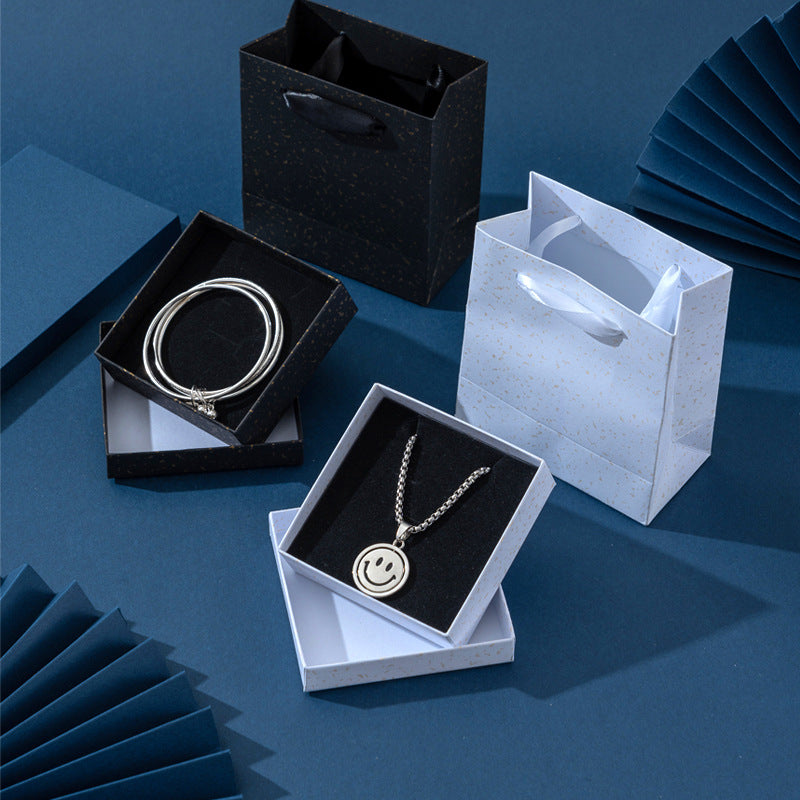 Elegante caja de regalo de joyería negra y dorada para pendientes, collares, anillos y pulseras, exhibición de empaque y almacenamiento