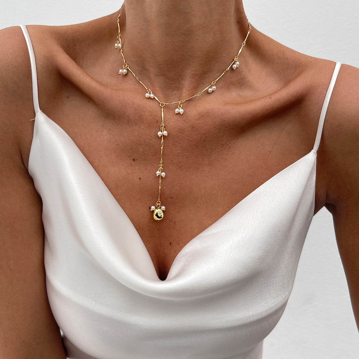 Minimalist French Vintage Liquid Drop Pendant Necklace with Imitation Pearl and Plated Copper Chain in Y-Shape with Fringe Detail