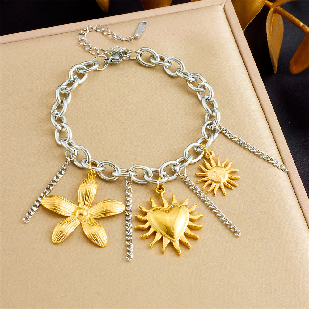 Bracciale unico in acciaio inossidabile color-block con ciondoli a forma di ape, fiore, stella marina e ciliegia