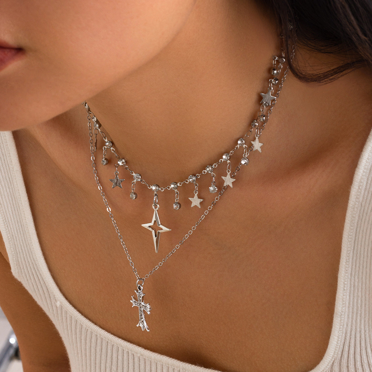 Collana girocollo da donna con croce a forma di stella, dolce e grintosa, con strass e nappe, in lega placcata