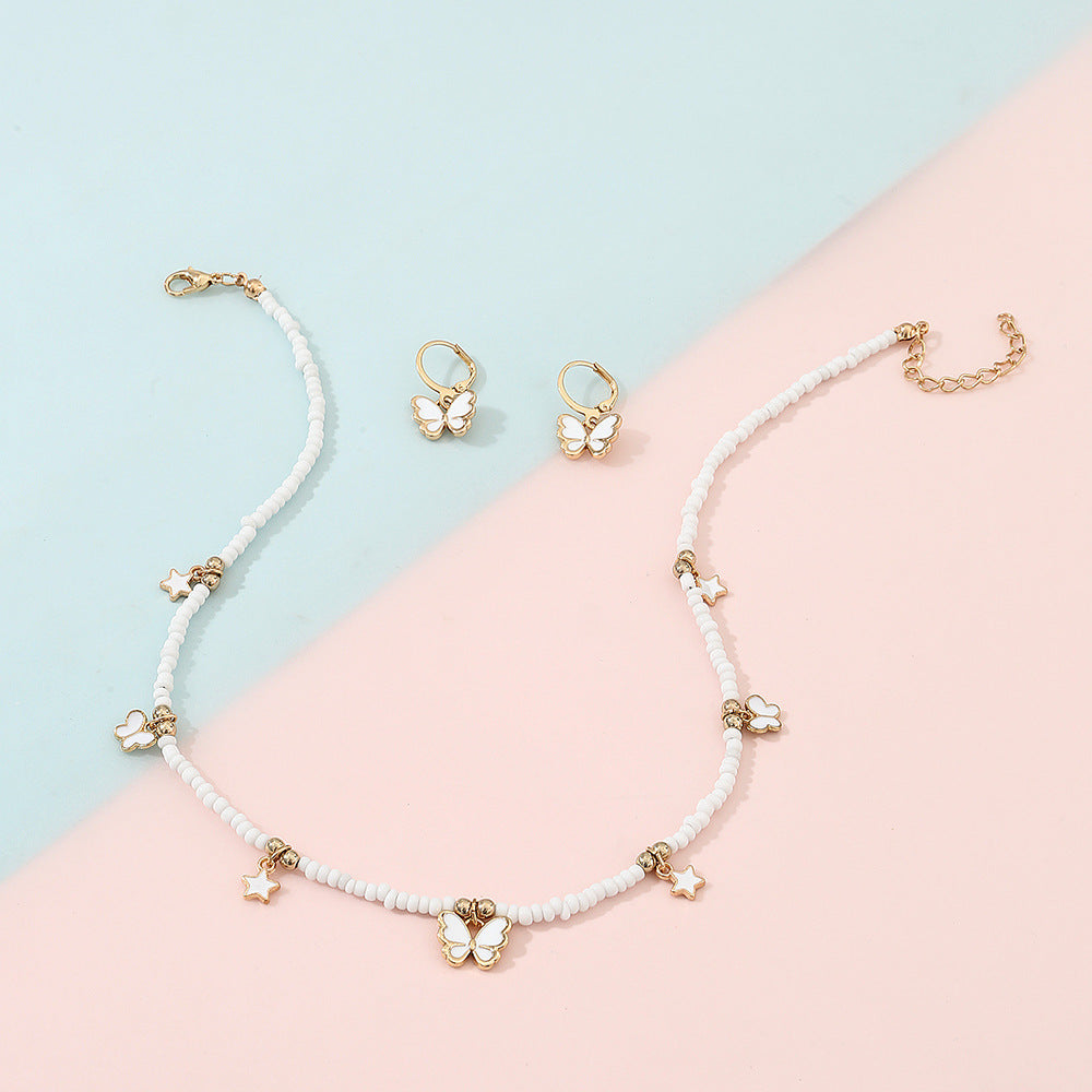 Set de collar con colgante minimalista de mariposa y estrella para niñas, joyería de aleación con cadena de perlas