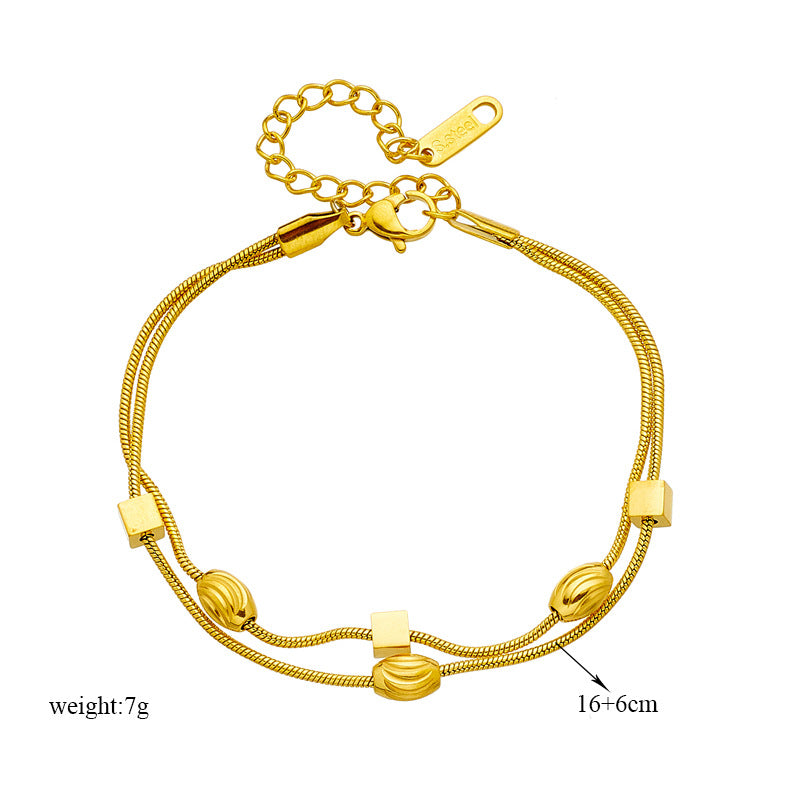 Pulsera minimalista de acero de titanio chapado con doble capa geométrica irregular para mujer