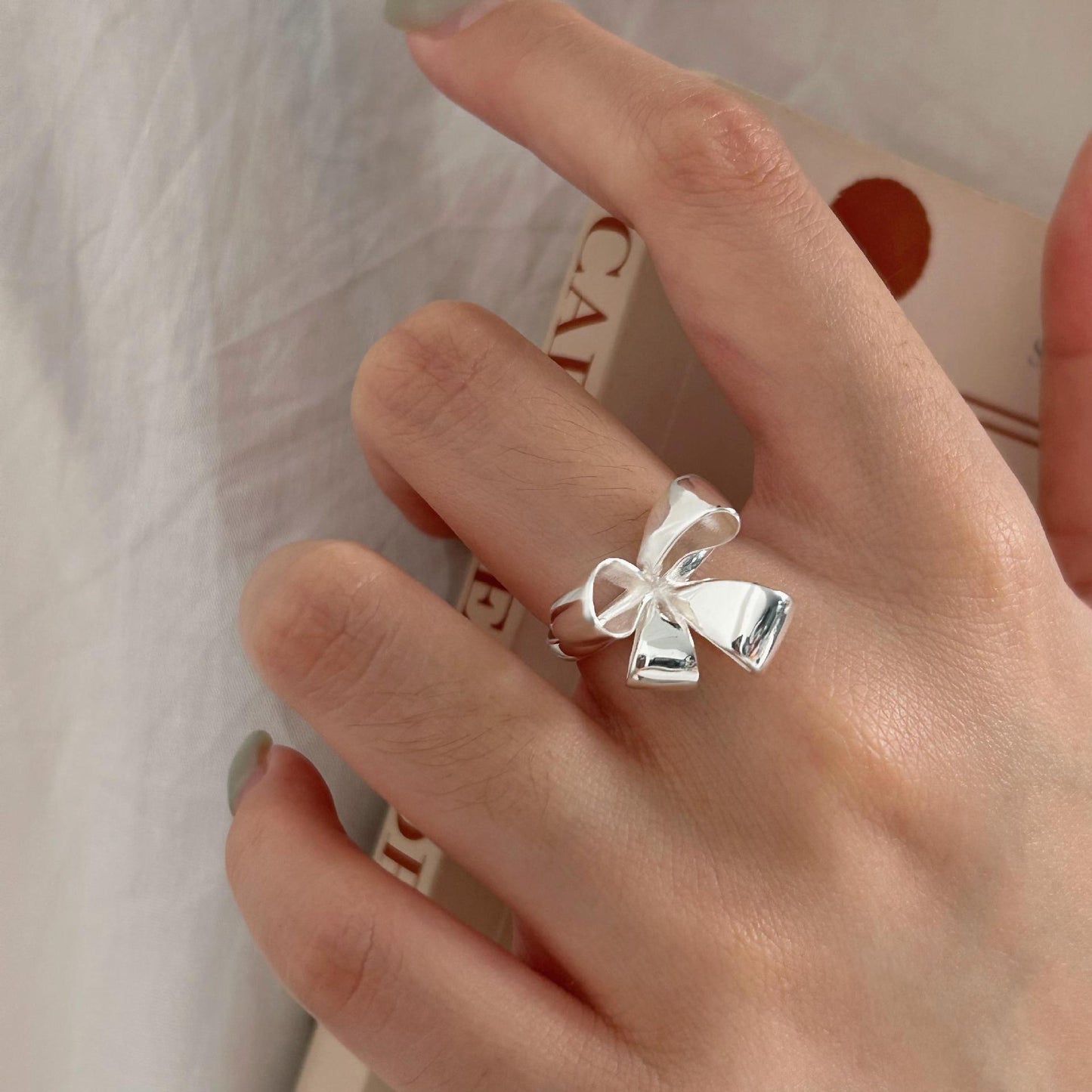 Minimalist Bowknot Heart-Shaped S925 Sterling Silver Ring with Plated Finish for Women