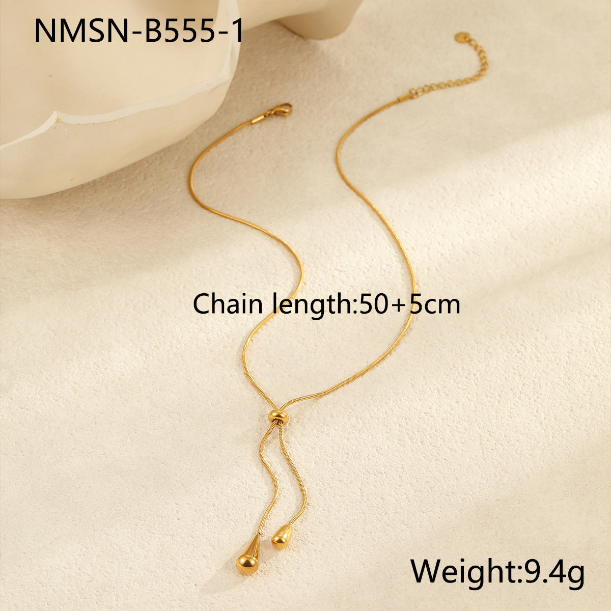 Collar minimalista con colgante de gota de acero de titanio tono frío con baño de oro para mujer