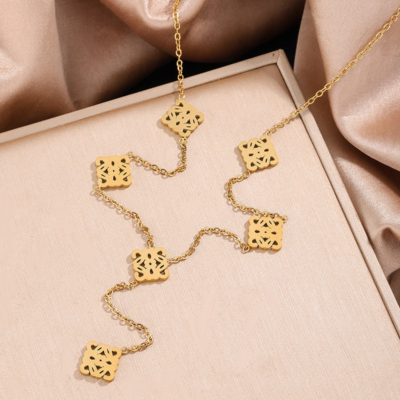 Set Collana e Bracciale in Acciaio Inossidabile con Tagli Geometrici Vuoti di Lusso Placcato Oro 18K