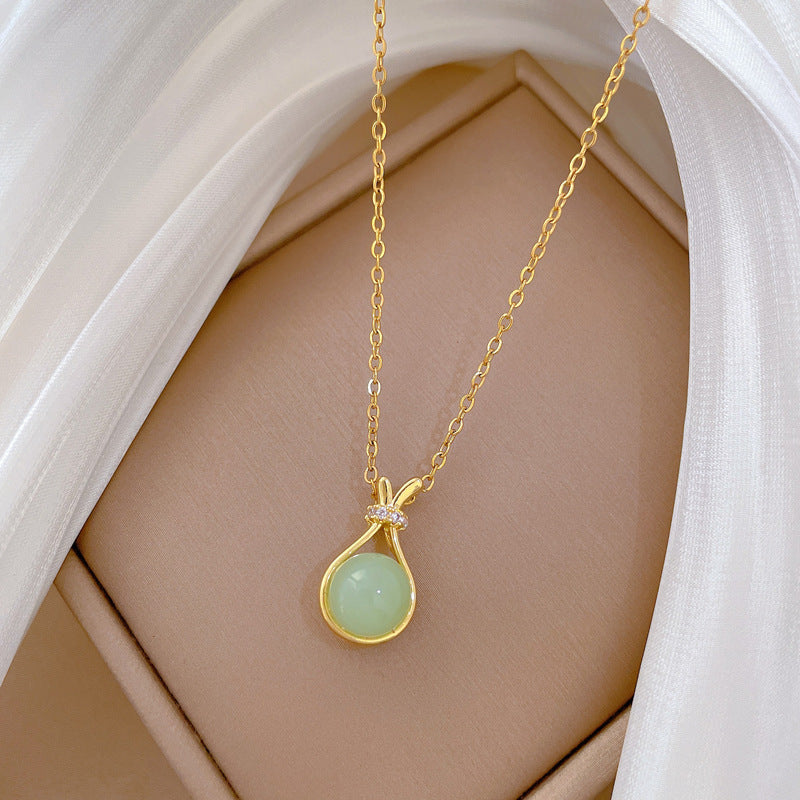 Collar con colgante de bolsa de la suerte minimalista para mujer, cadena de serpiente de acero inoxidable con detalles de diamantes de imitación completos y diseño de animal del zodíaco