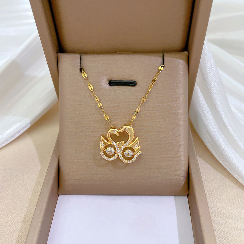 Elegante collar con colgante de cisne para mujeres y hombres, cadena de acero de titanio con incrustaciones de diamantes de imitación, estilo relicario de lujo, diseño geométrico minimalista
